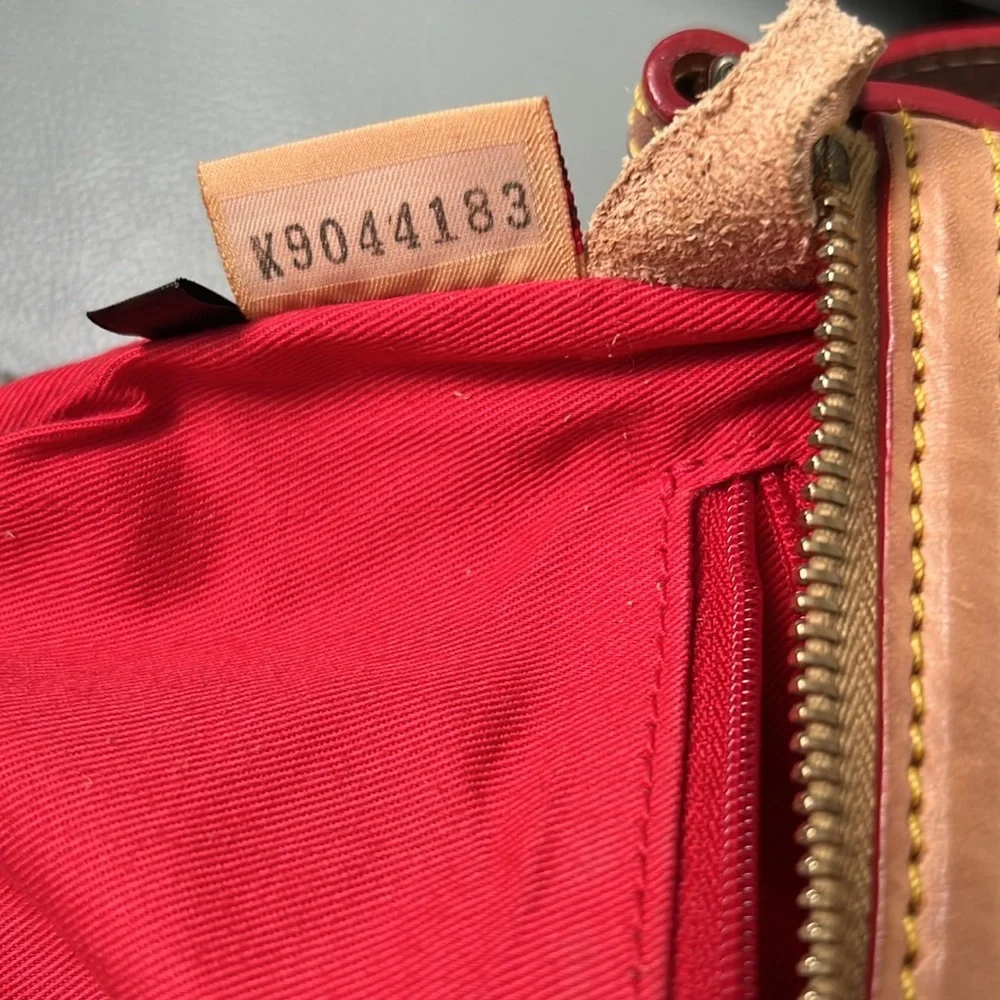 Dooney & Bourke Tan canvas DB signature Crossbody Bag with Leather Trim